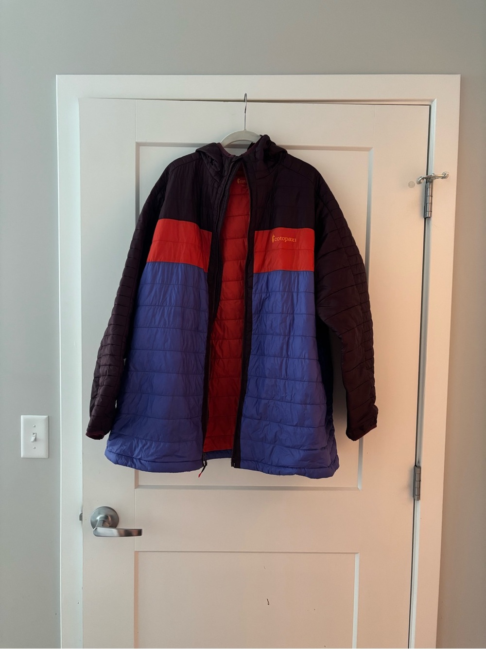 cotopaxi Women's Quilted Jacket in Red and Dark Brown